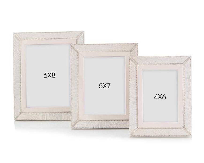 Picture of SET OF THREE CREAM LEATHER PHOTO FRAMES
